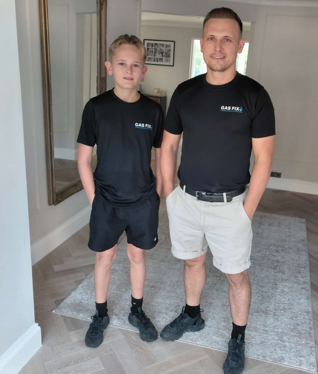 Founder Lewis Edwards with his son in Gas Fix uniform